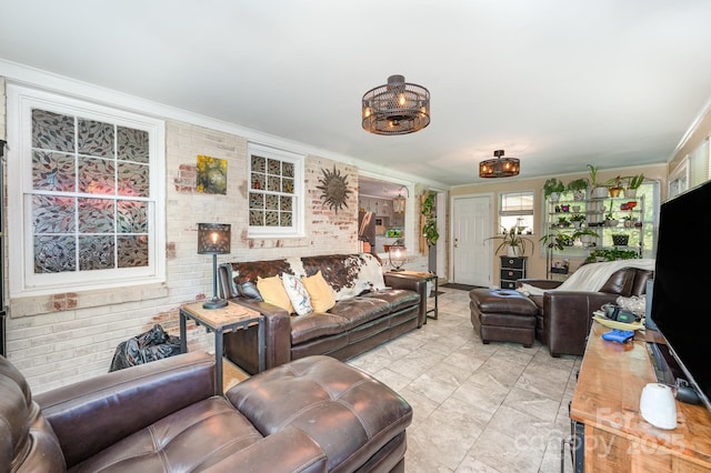 1115 Grovewood Dr, Charlotte, NC 28208 - living area with brick wall and crown molding