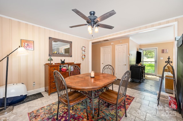 1115 Grovewood Dr, Charlotte, NC 28208 - dining space with ornamental molding, baseboards, and ceiling fan