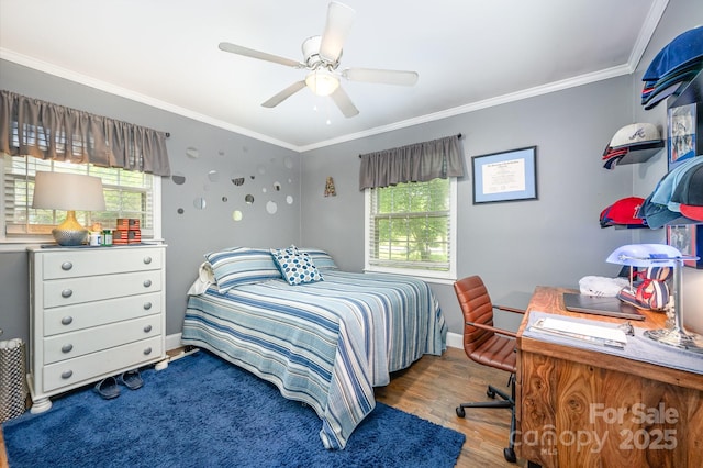 1115 Grovewood Dr, Charlotte, NC 28208 - bedroom featuring ornamental molding, wood finished floors, ceiling fan, an office area, and baseboards