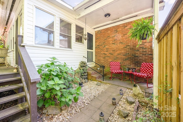 1115 Grovewood Dr, Charlotte, NC 28208 - view of patio featuring entry steps