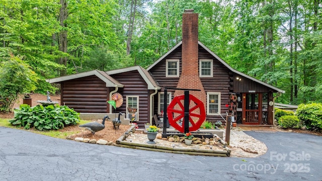 3763 Laurel Heights Dr, Morganton, NC 28655 - log-style house with a chimney