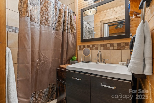 3763 Laurel Heights Dr, Morganton, NC 28655 - full bathroom featuring vanity, tile walls, and wooden walls