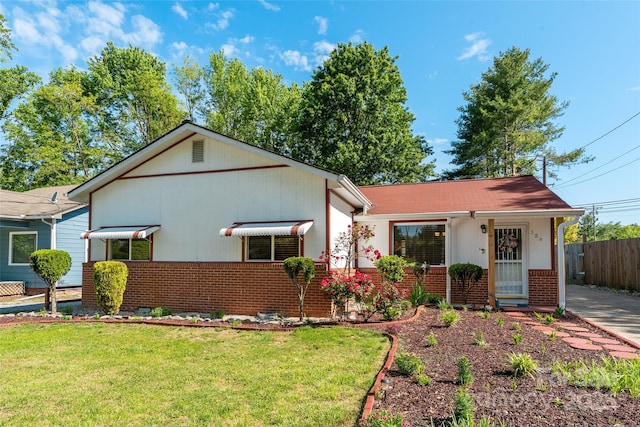 bungalow-style house featuring brick siding