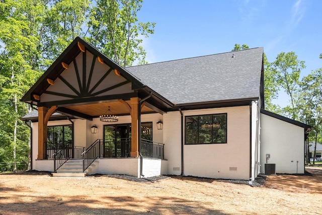 1408 Bloomsberry Ln, Waxhaw, NC 28173 - back of property featuring roof with shingles, crawl space, central air condition unit, and covered porch