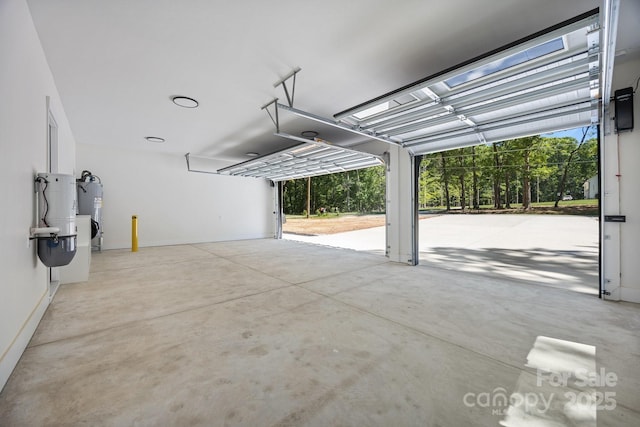 1408 Bloomsberry Ln, Waxhaw, NC 28173 - garage featuring electric water heater and baseboards