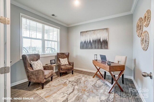 office area featuring wood finished floors, ornamental molding, and baseboards