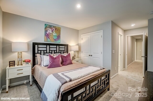 bedroom featuring baseboards, a closet, carpet, and recessed lighting