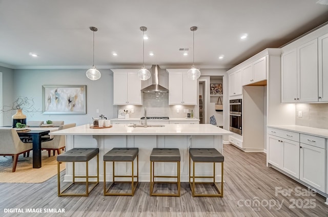 9945 Cask Way, Huntersville, NC 28078 - kitchen with wall chimney range hood, backsplash, light countertops, white cabinets, and recessed lighting
