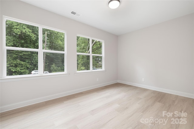 515 Dixie Dr, Mooresville, NC 28115 - unfurnished room featuring light wood-style floors and baseboards