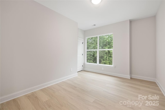 515 Dixie Dr, Mooresville, NC 28115 - unfurnished room with light wood-style flooring