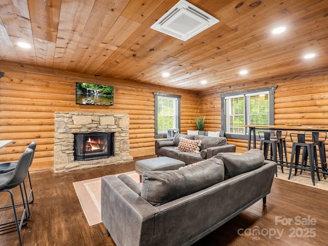 living room with a fireplace, hardwood / wood-style floors, wood ceiling, and recessed lighting
