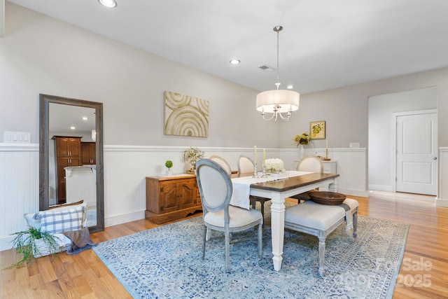 4616 Gold Finch Dr, Denver, NC 28037 - dining space featuring a wainscoted wall, a chandelier, light wood-type flooring, and recessed lighting