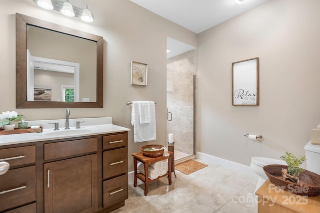 4616 Gold Finch Dr, Denver, NC 28037 - bathroom featuring toilet, a shower stall, vanity, and baseboards