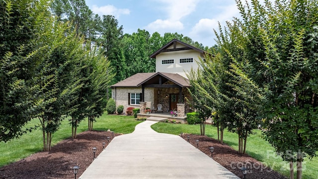 4616 Gold Finch Dr, Denver, NC 28037 - view of front of property with stone siding, covered porch, and a front yard