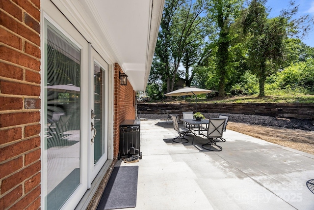 view of patio featuring outdoor dining space