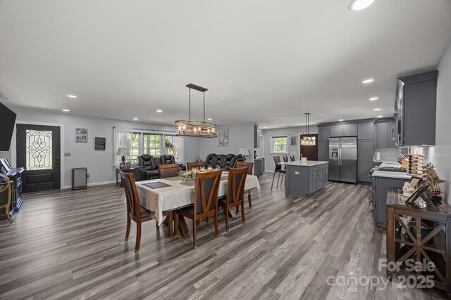 2076 Junction Rd, Mocksville, NC 27028 - dining room featuring wood finished floors, recessed lighting, healthy amount of natural light, and baseboards