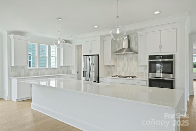 13605 Tranquil Day Dr, Matthews, NC 28105 - kitchen with stainless steel appliances, wall chimney exhaust hood, light countertops, decorative backsplash, and recessed lighting