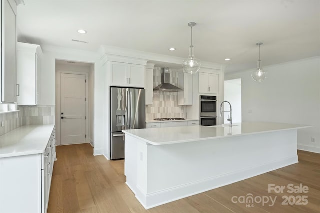 13605 Tranquil Day Dr, Matthews, NC 28105 - kitchen with stainless steel appliances, wall chimney exhaust hood, decorative backsplash, recessed lighting, and white cabinets