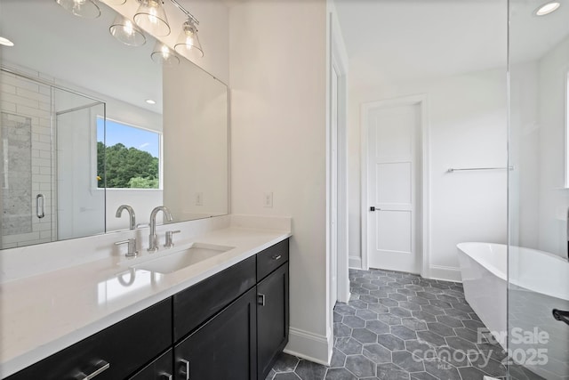 13605 Tranquil Day Dr, Matthews, NC 28105 - full bath featuring a freestanding bath, vanity, a stall shower, and recessed lighting