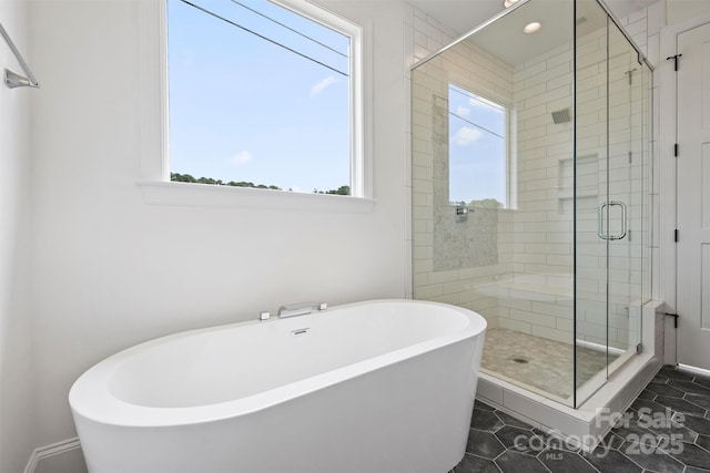 13605 Tranquil Day Dr, Matthews, NC 28105 - full bathroom featuring a soaking tub, a stall shower, tile patterned floors, and recessed lighting