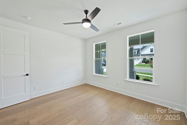 13605 Tranquil Day Dr, Matthews, NC 28105 - unfurnished room featuring light wood-style flooring, a smoke detector, and ceiling fan