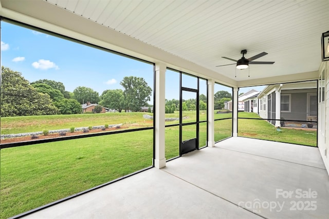 13605 Tranquil Day Dr, Matthews, NC 28105 - unfurnished sunroom featuring ceiling fan