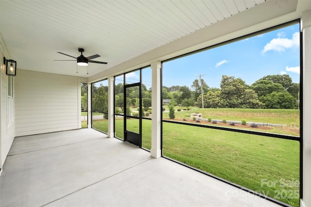 13605 Tranquil Day Dr, Matthews, NC 28105 - unfurnished sunroom with ceiling fan and view of scattered trees