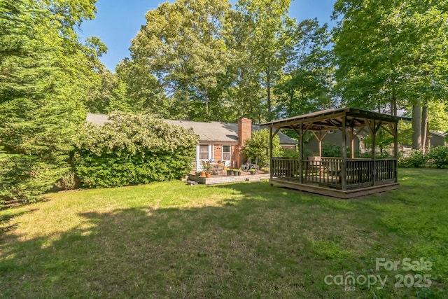4424 Huntington Dr, Gastonia, NC 28056 - view of grassy yard with a gazebo and a deck