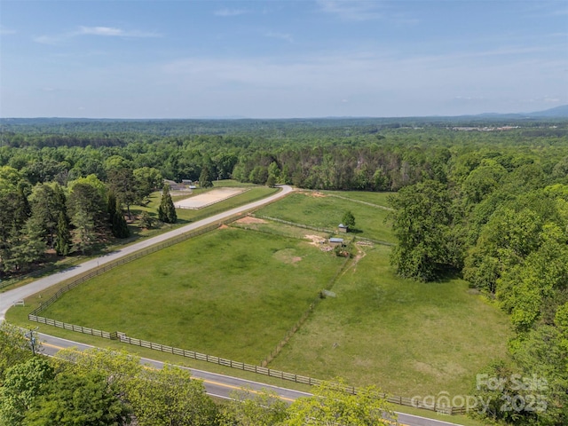 overview of rural landscape with a heavily wooded area