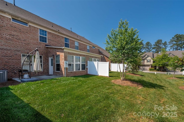 5014 Forest Hills Pl, Fort Mill, SC 29707 - rear view of property featuring brick siding and central AC