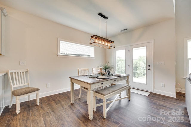 18011 Wilbanks Dr, Charlotte, NC 28278 - dining space featuring dark wood-style flooring and baseboards