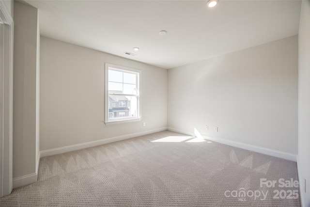 18011 Wilbanks Dr, Charlotte, NC 28278 - empty room featuring baseboards, carpet, and recessed lighting