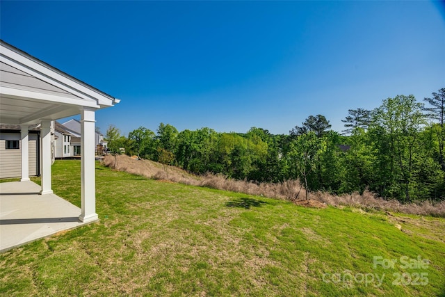 18011 Wilbanks Dr, Charlotte, NC 28278 - view of grassy yard with a patio area