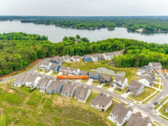 18011 Wilbanks Dr, Charlotte, NC 28278 - aerial perspective of suburban area with a nearby body of water and a forest