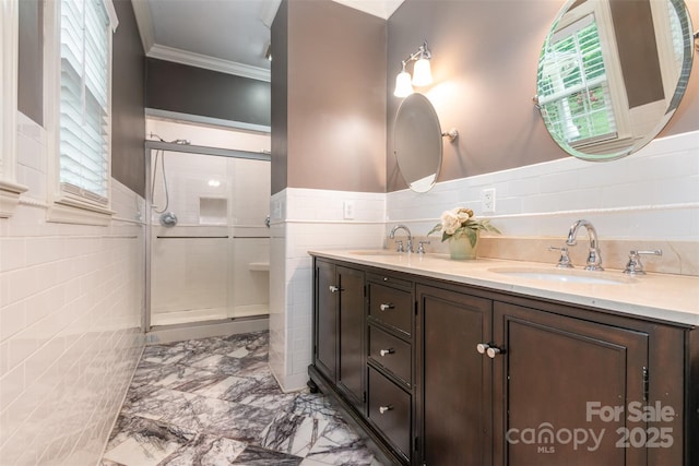408 Idlewood Dr, Kannapolis, NC 28083 - full bath featuring tile walls, ornamental molding, a shower stall, marble look tiles, and double vanity