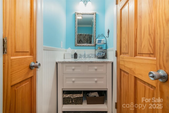 408 Idlewood Dr, Kannapolis, NC 28083 - bathroom with a wainscoted wall and vanity