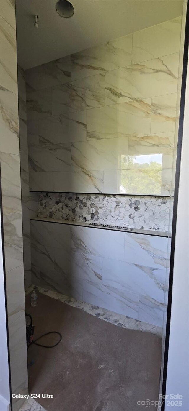 bathroom featuring a shower