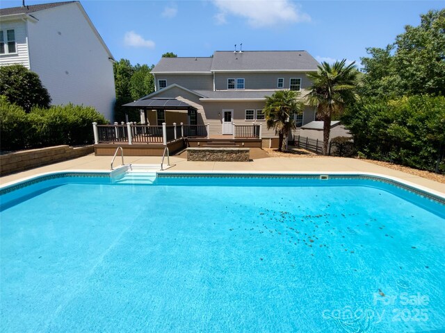 903 Furman Ct, Fort Mill, SC 29708 - swimming pool with a wooden deck and fence