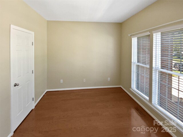 903 Furman Ct, Fort Mill, SC 29708 - unfurnished room with wood finished floors, healthy amount of natural light, and baseboards