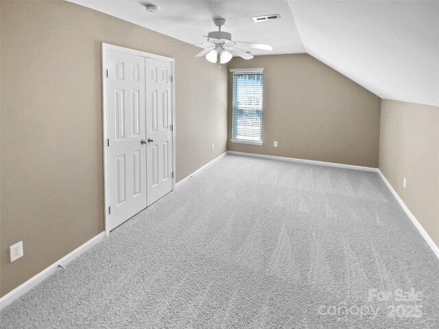 903 Furman Ct, Fort Mill, SC 29708 - bonus room featuring a ceiling fan, lofted ceiling, carpet flooring, and baseboards