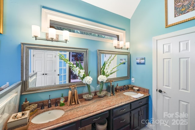 1337 Braeburn Rd NW, Concord, NC 28027 - full bath with double vanity and lofted ceiling