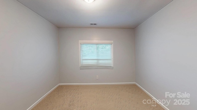 1337 Braeburn Rd NW, Concord, NC 28027 - unfurnished room with baseboards and carpet floors