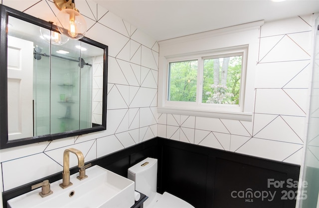 37 Geneva Cir Unit 1/2, Franklin, NC 28734 - bathroom featuring tile walls, a stall shower, and a chandelier