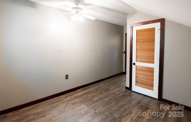 37 Geneva Cir Unit 1/2, Franklin, NC 28734 - spare room with dark wood-style flooring, vaulted ceiling, and a ceiling fan