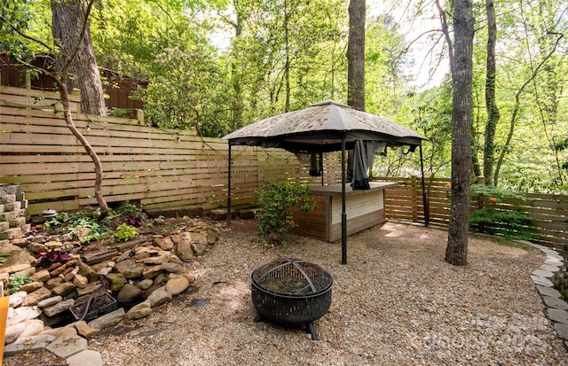 37 Geneva Cir Unit 1/2, Franklin, NC 28734 - fenced backyard with a fire pit