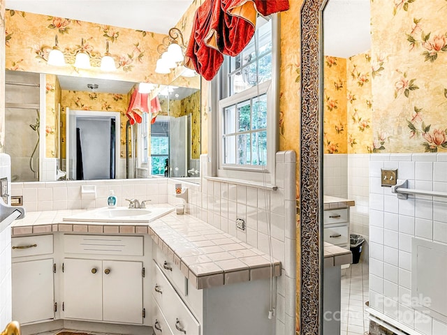 200 Woodside Dr, Morganton, NC 28655 - bathroom with wallpapered walls, a wainscoted wall, tile walls, and vanity