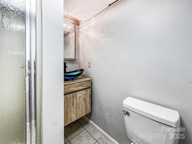 200 Woodside Dr, Morganton, NC 28655 - bathroom featuring tile patterned floors, toilet, and vanity