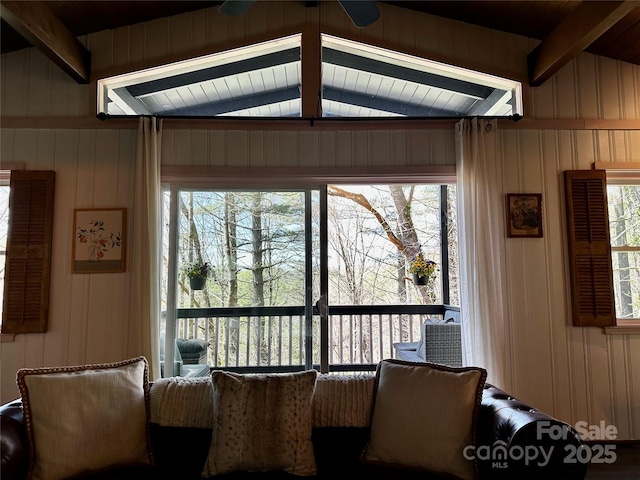 living room featuring wooden walls