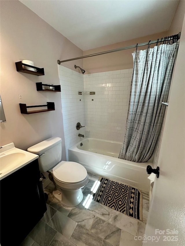 bathroom featuring shower / tub combo with curtain, toilet, vanity, and marble finish flooring