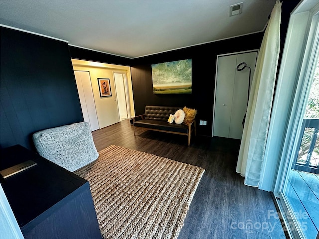 living area with wood finished floors